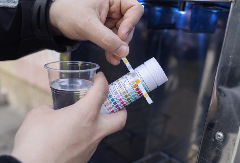 Man checking water quality